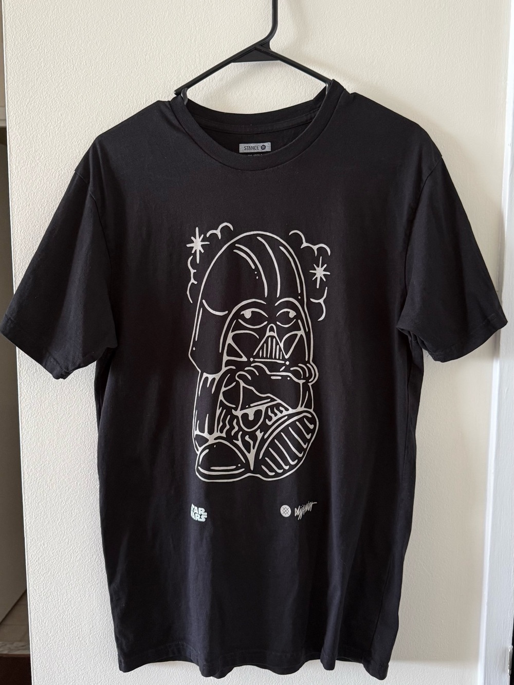 Stance Black Tee with White Darth Vader Helmet Cartoon Graphic